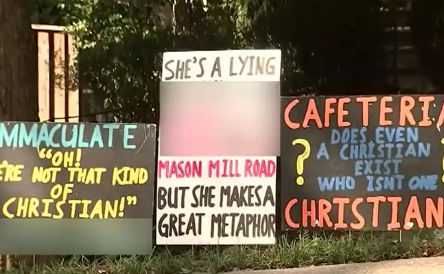 Residents fed up with neighbor's controversial lawn signs and displays